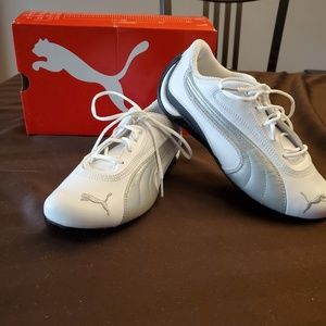 Brand new white and silver puma sneakers